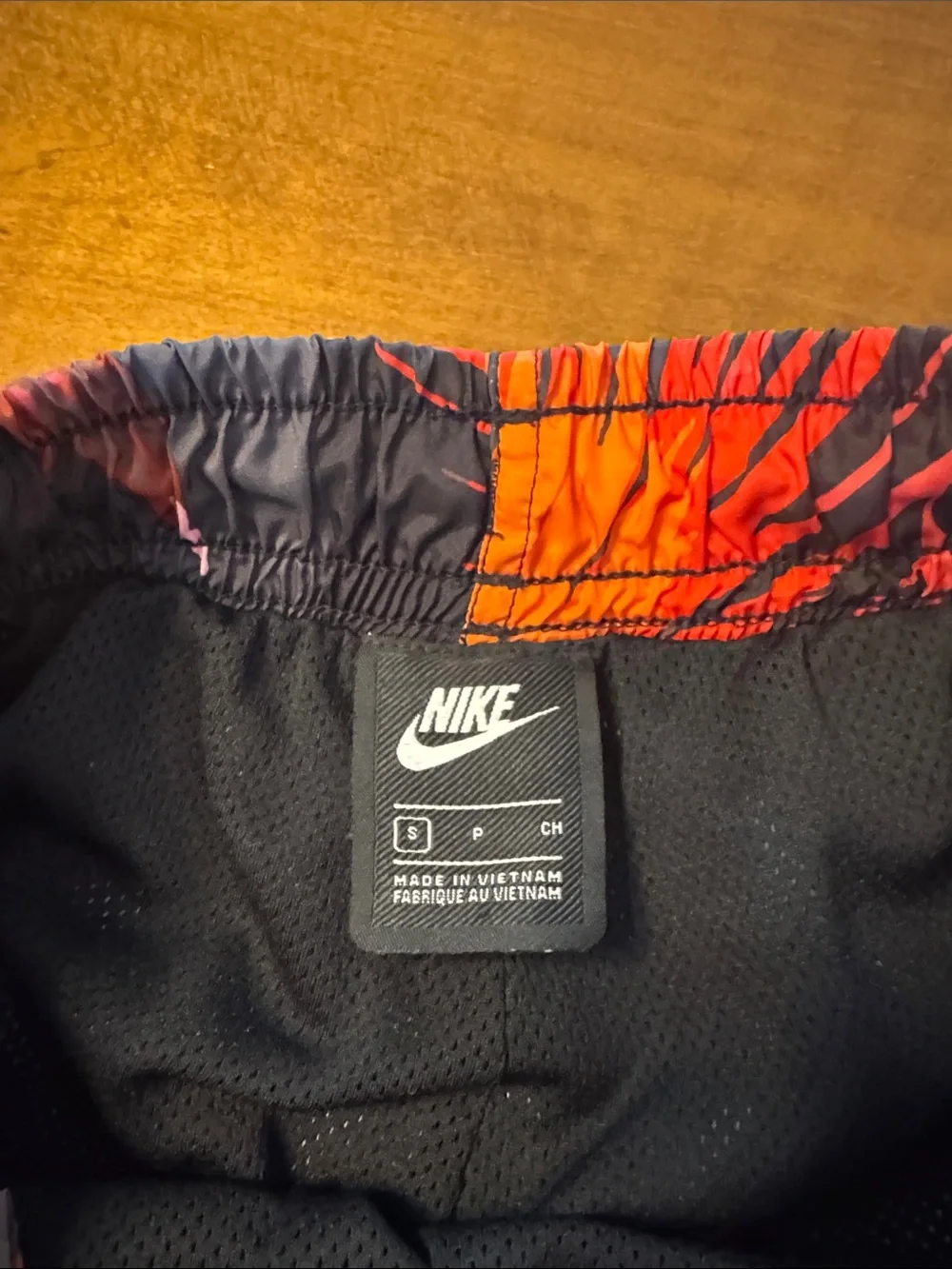 Nike Men’s Navy Swim Trunks with Red, Pink and Orange Floral Print